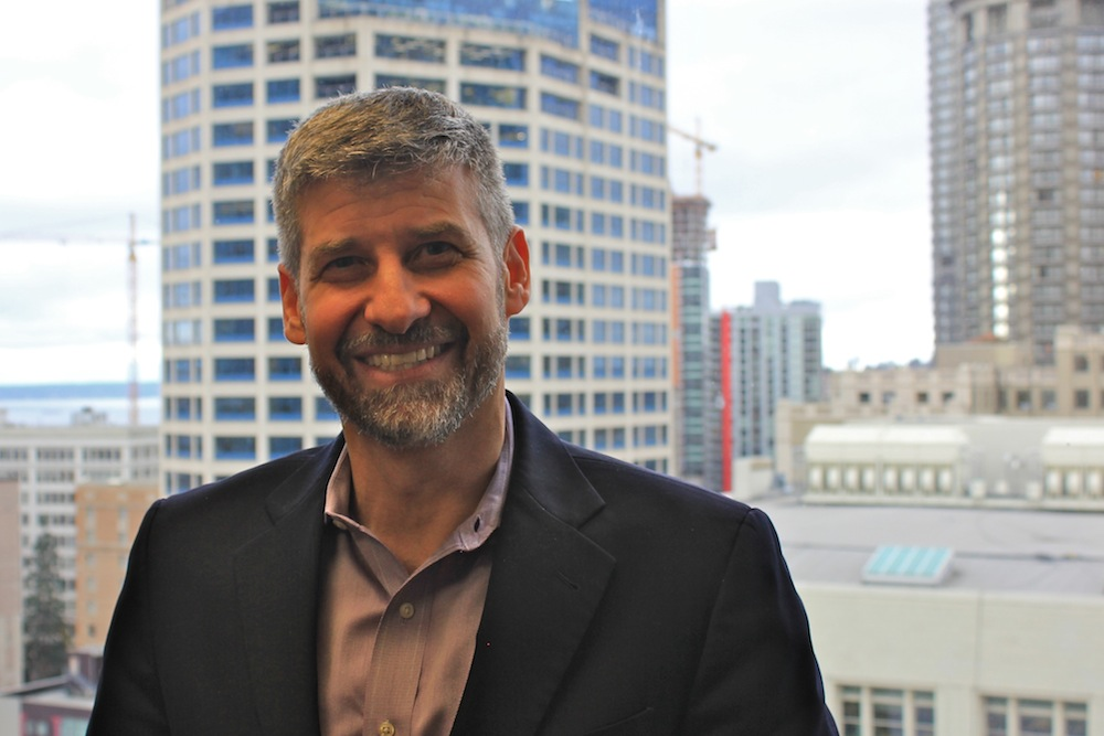 A thumbnail image of Matt Dubin with a Seattle backdrop.